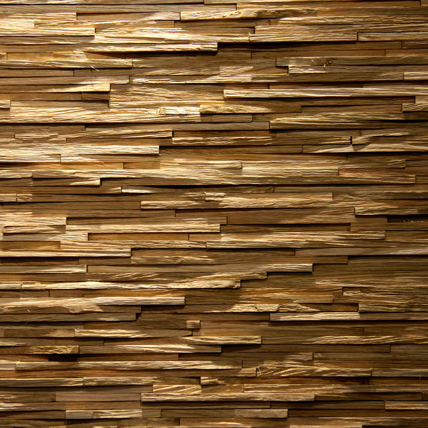 An accent wall made from natural raw wood, mixing simple strips.