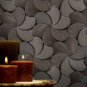 An environment with a decorative wall panel of ours. In this case, the photo shows a Origami Collection product with the reference PL-IP-K02. This Product is a dark-veneer finish wood board with over 300 pieces per square meter. Each piece has a flower like shape, and the pattern feels like each arrangement is placed on top of each other. A decorative wood panel design for application on walls, withc custom-made boards.