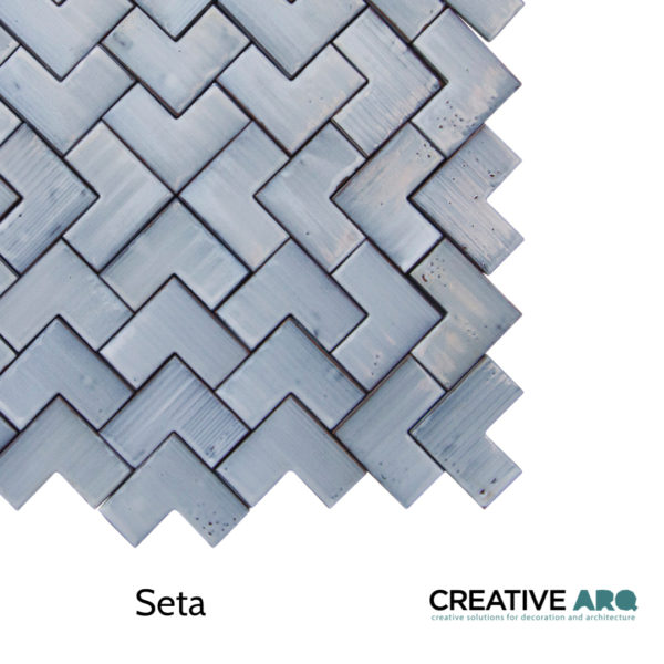 A 3D wall ceramic tile with colorful features and partially handmade in Portugal. Um azulejo tridimensional e feito parcialmente à mão em Portugal.