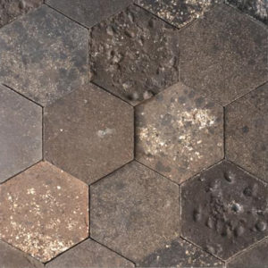 A panel made from raw earth, mixed with mineral sediments.